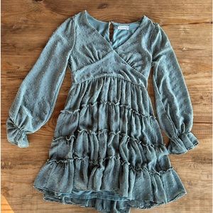 Green textured dress. Zip up back. Lining.